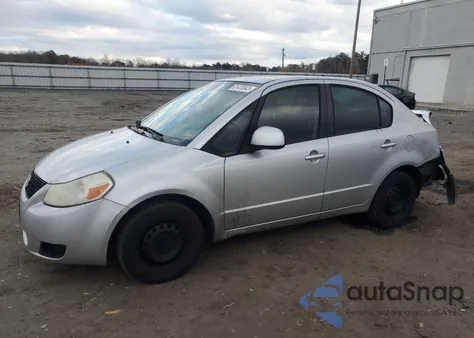 2010 Suzuki Sx4 Le z USA, uszkodzony, nr VIN JS2YC5A28A6302731